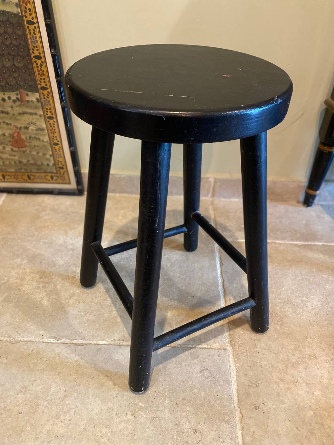 Black wooden stool