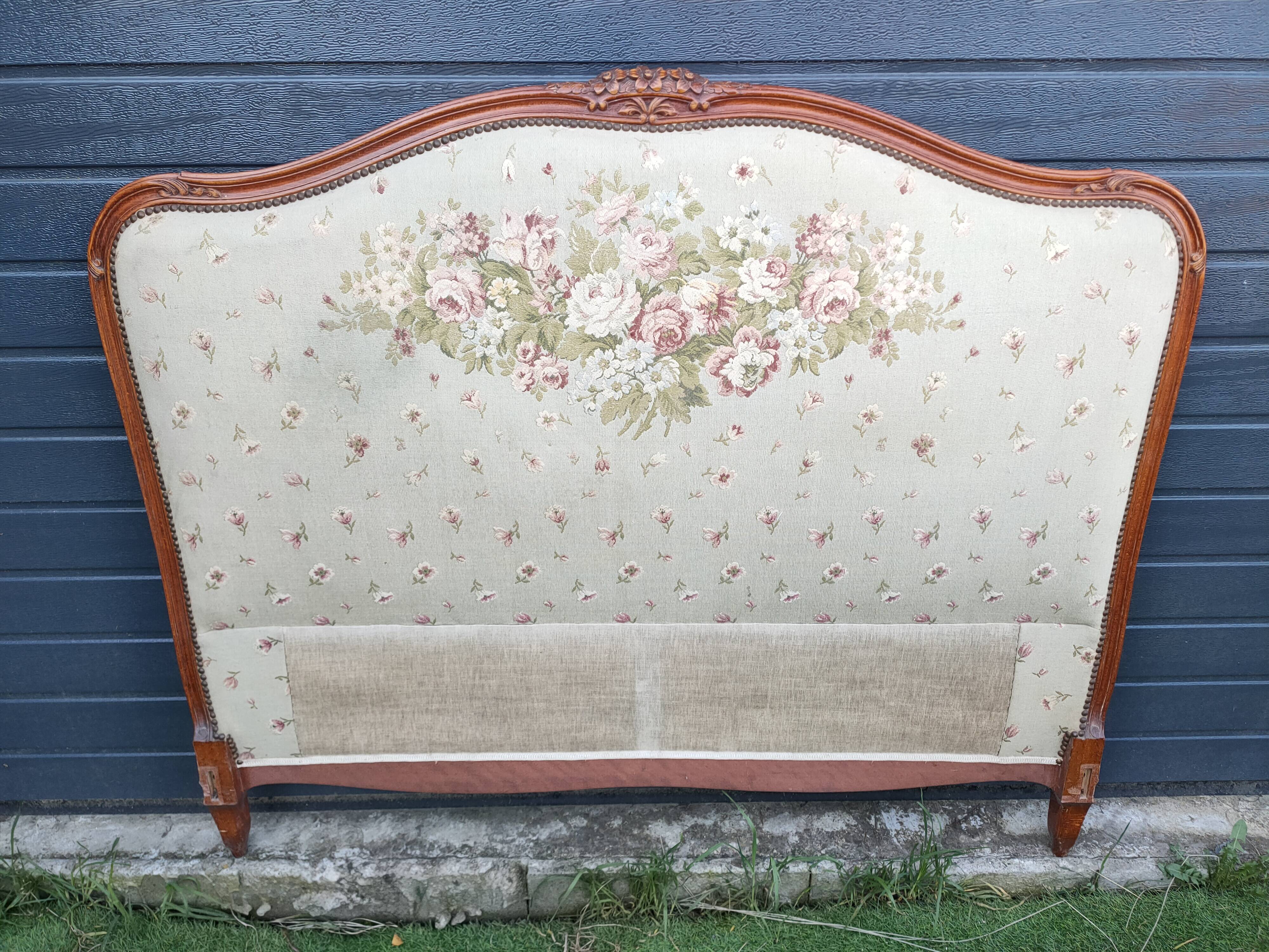 antique fabric and wood headboard