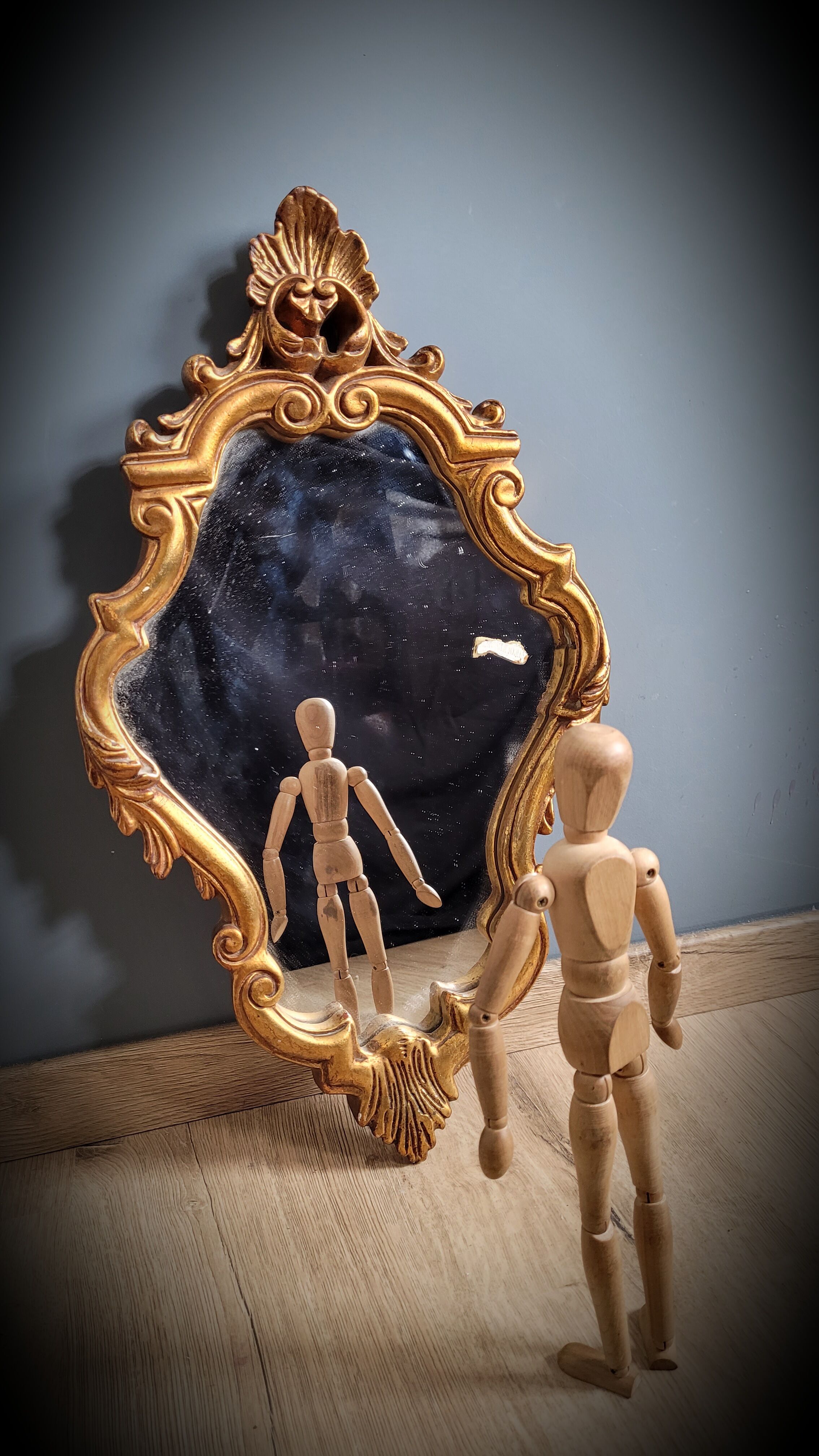 Gilded mirror worked 33x58cm