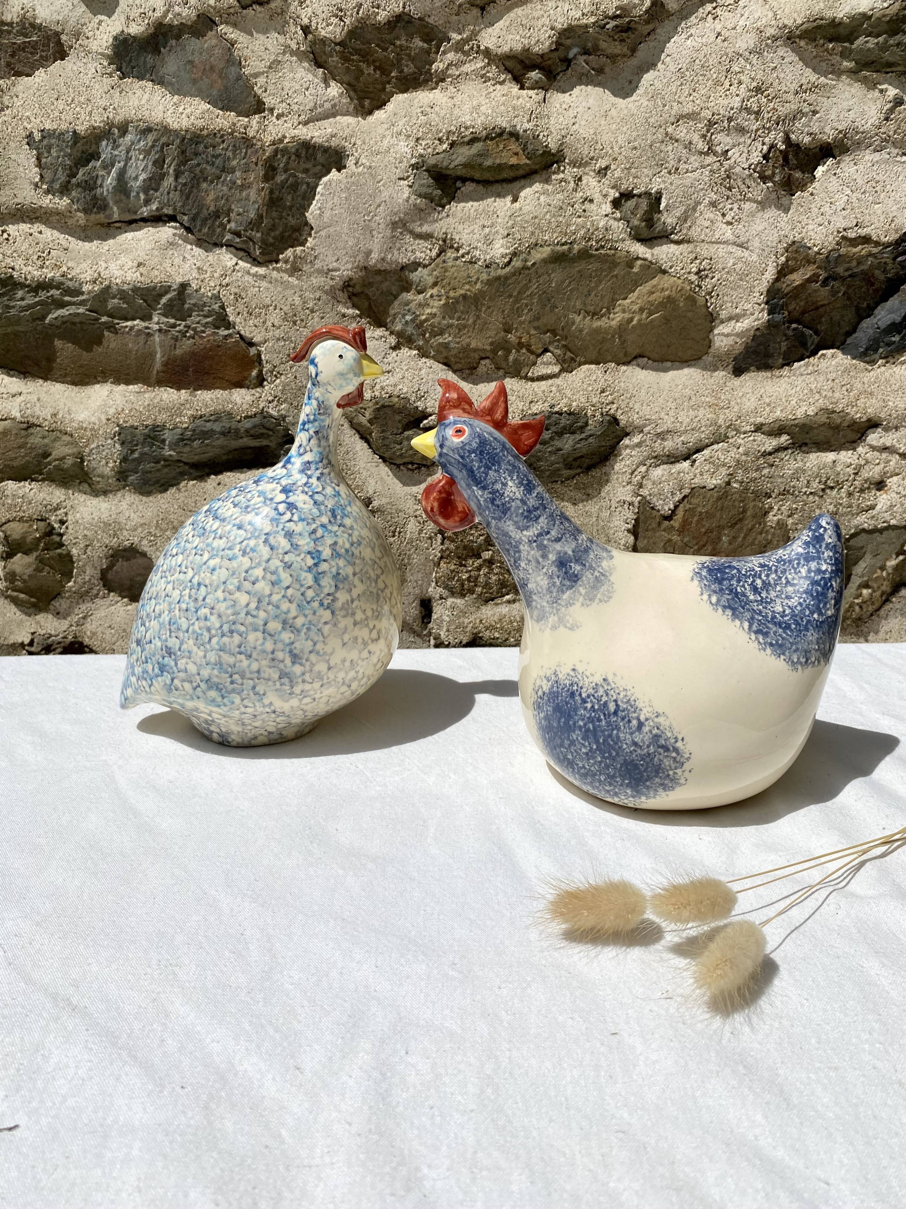 Signed ceramic hen and guinea fowl
