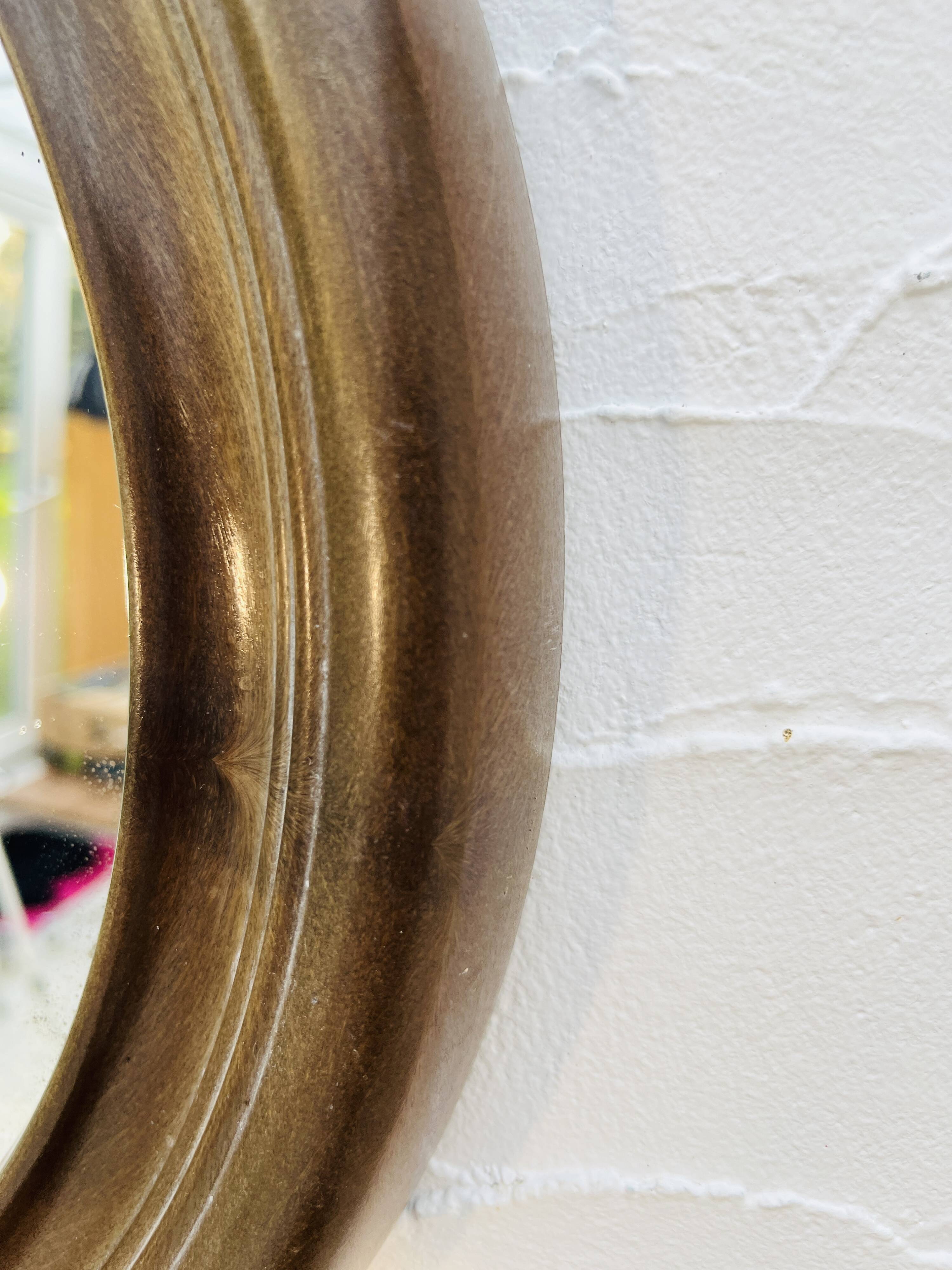 Vintage oval mirror Syla model 920 from the 1970s.