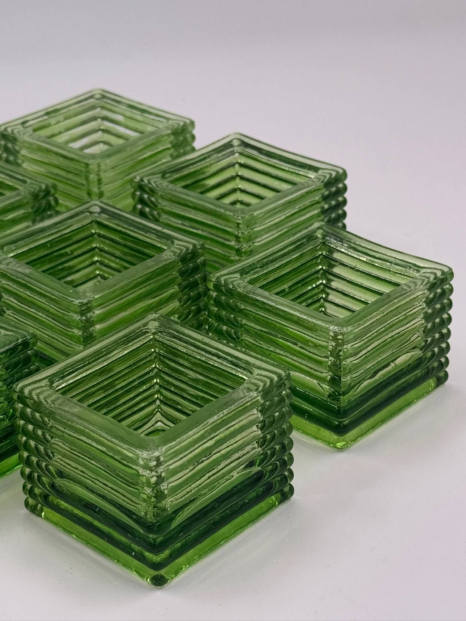 Set of 8 vintage green pressed glass candle holders