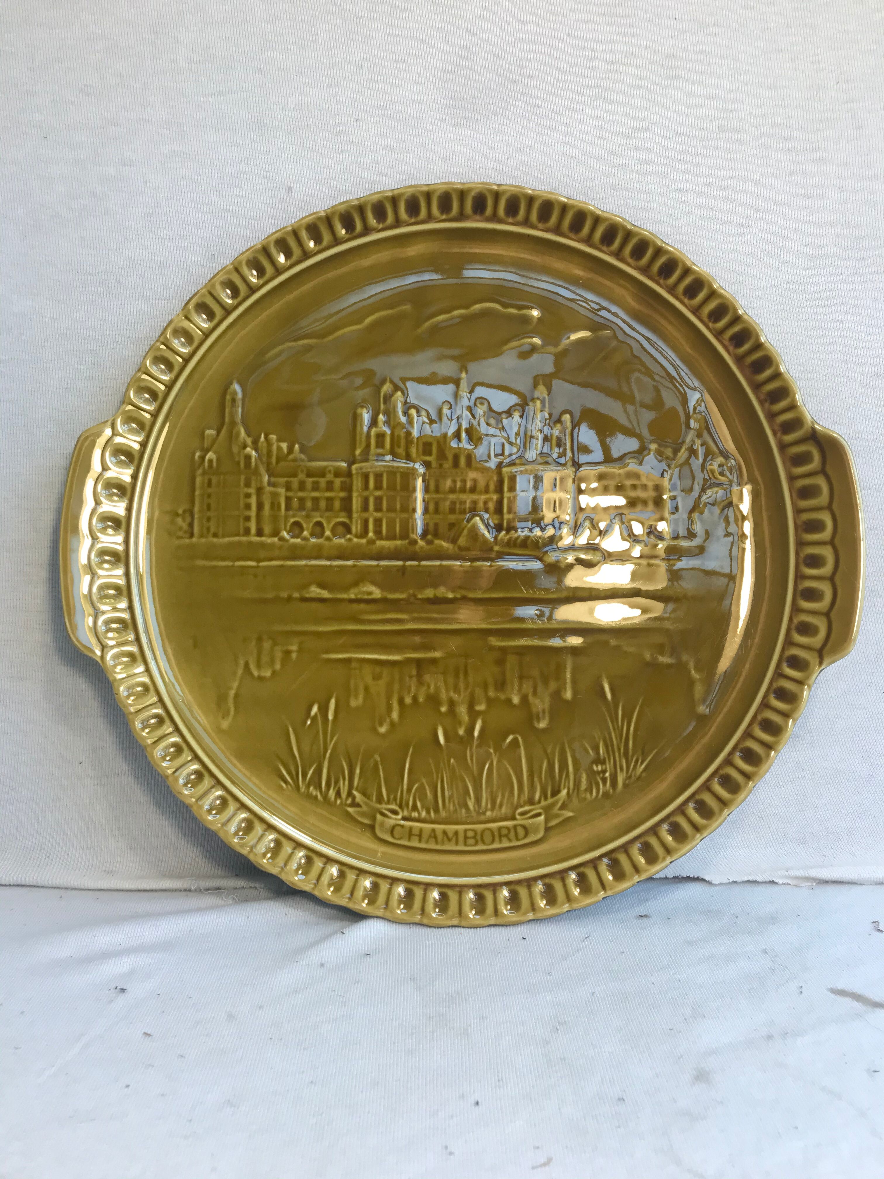 Old dish Gien, drawing chateau chambord in relief and vintage green ceramics