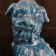 Pair of Foo dog bookends in turquoise glazed ceramic, Manises