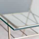 Glass and metal coffee table
