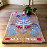Tapis tufté à la main