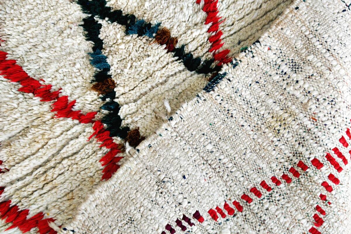 Small vintage beni ouarain rug