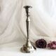 Chromed metal candle holder