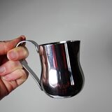 Set of 4 vintage bar measures in brushed stainless steel from the 60s-70s.