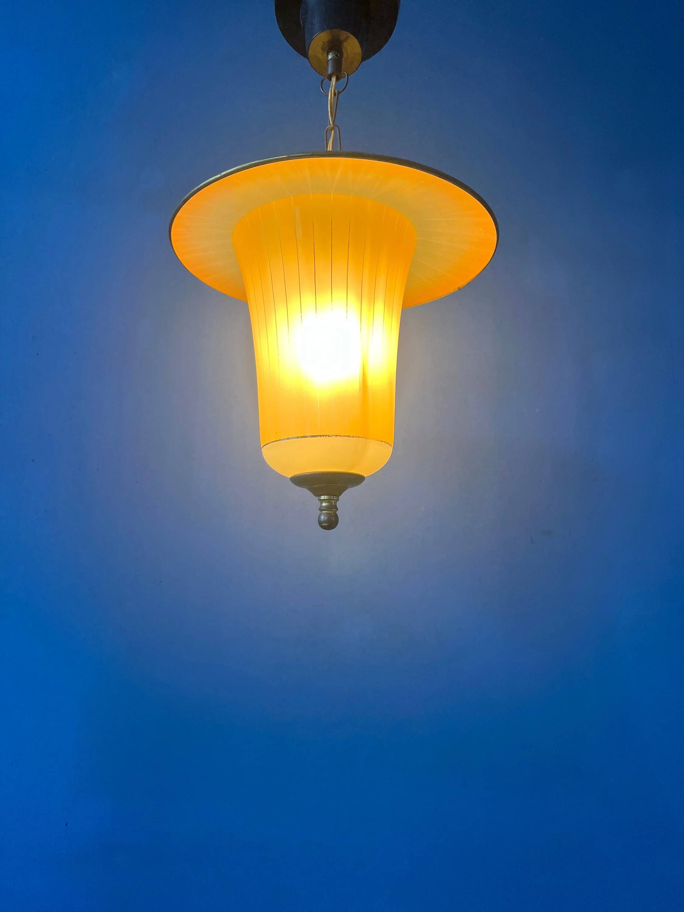 Vintage 1950s glass and brass pendant light.