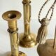 Trio of vintage knotted candlesticks brass
