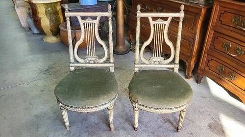 Pair of Louis XVI style chairs from the 18th century with lyre back.