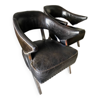 Pair of black and stainless steel leather armchairs