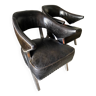 Paire de fauteuils cuir noir et inox