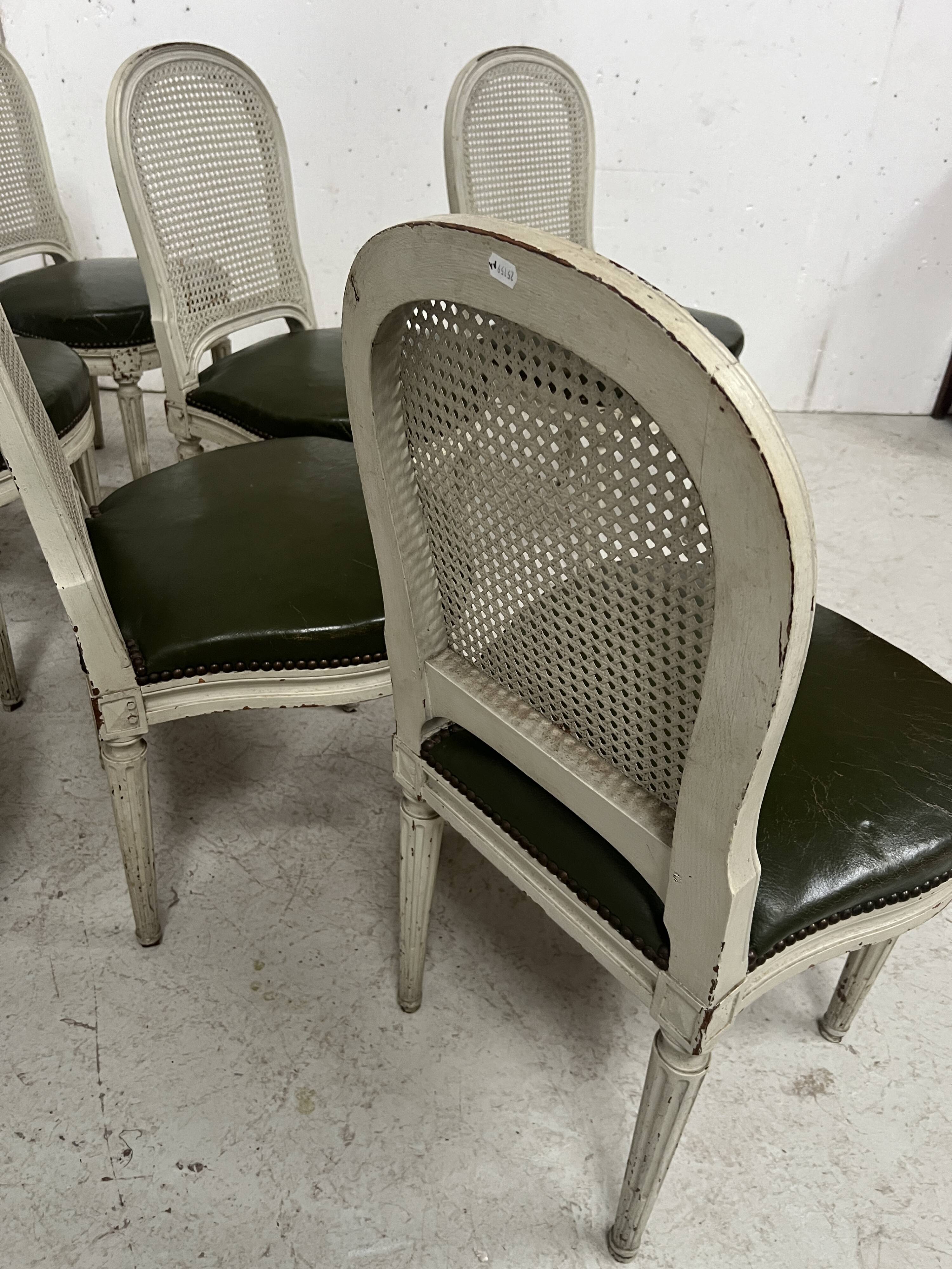 Set of seven Louis XVI style chairs in patinated beech, 20th century.