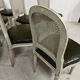 Set of seven Louis XVI style chairs in patinated beech, 20th century.