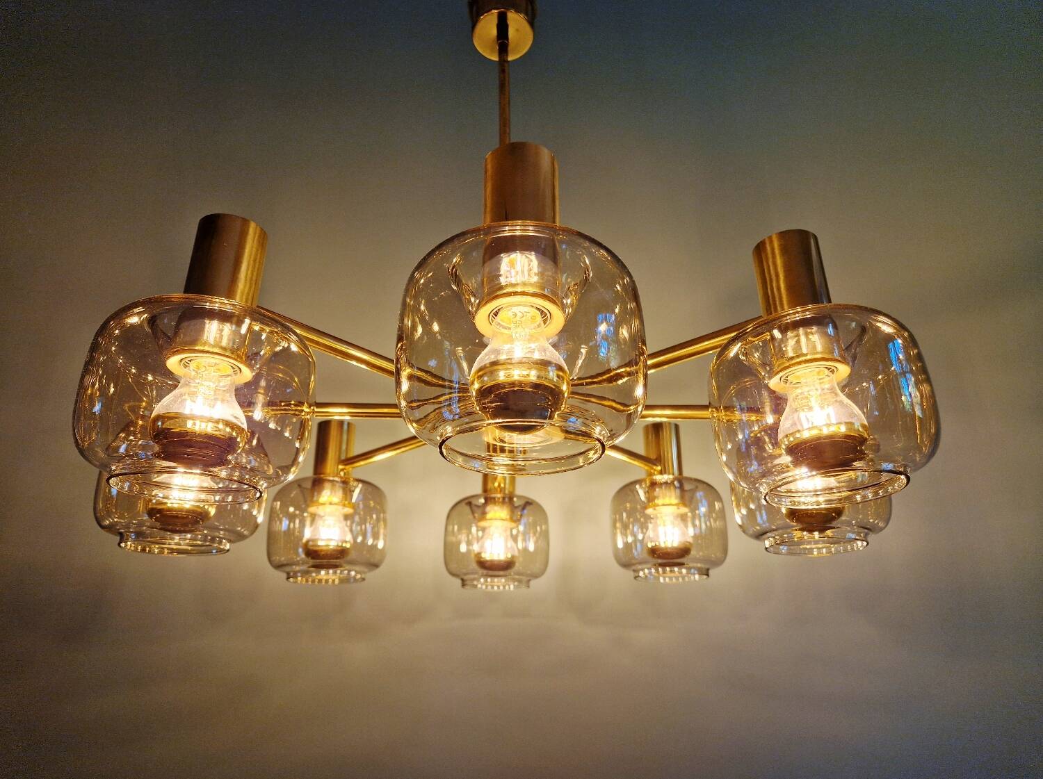 Large designer chandelier in brass and smoked glass globes, 1970s