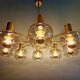 Large designer chandelier in brass and smoked glass globes, 1970s
