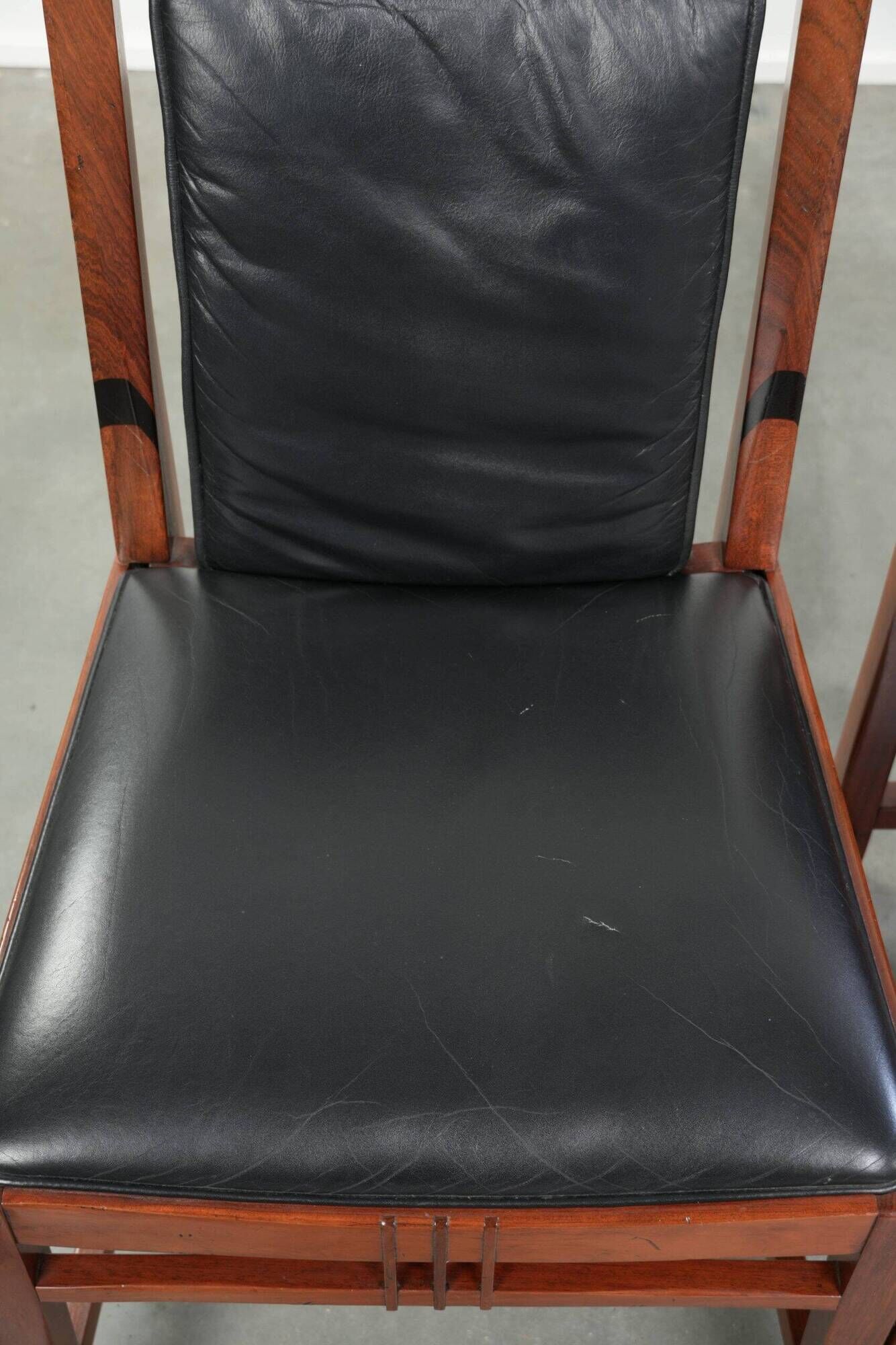 Elegant set of four black cowhide and wooden Art Deco dining chairs