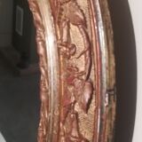 Miroir ovale art nouveau en stuc doré, 50x42 cm