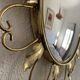 Vintage 1960s witch's eye sun mirror, domed gold metal - 45 cm