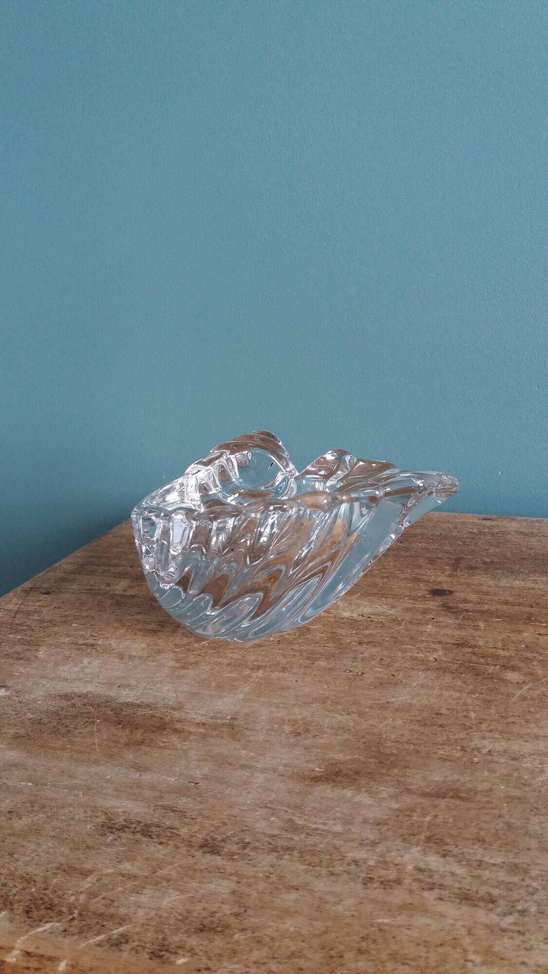 Shell-shaped crystal paperweight.