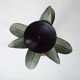 Antique palm tree-shaped candlestick in patinated metal