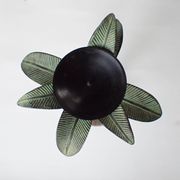 Antique palm tree-shaped candlestick in patinated metal
