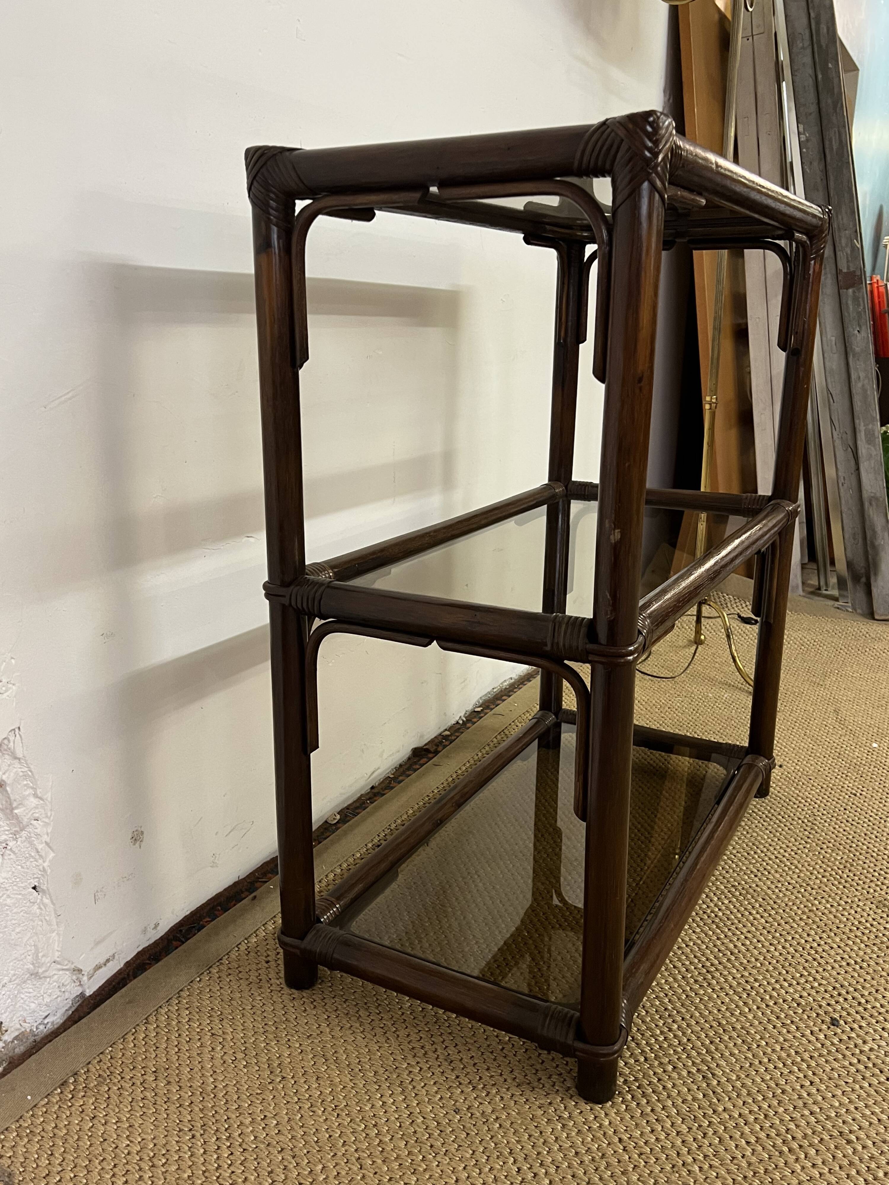 Rattan and smoked glass bookcase shelf