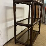 Rattan and smoked glass bookcase shelf