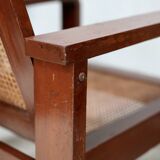 Pair of large armchairs. Wood and cane. Circa 1960