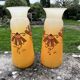Pair of orange Legras Art Deco enameled glass vases