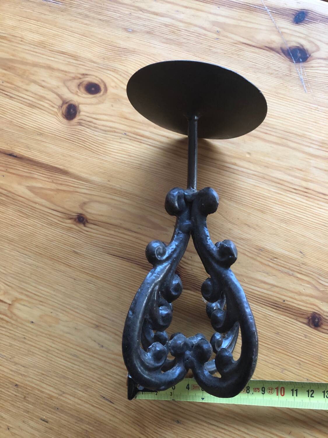 Cast iron candle holder