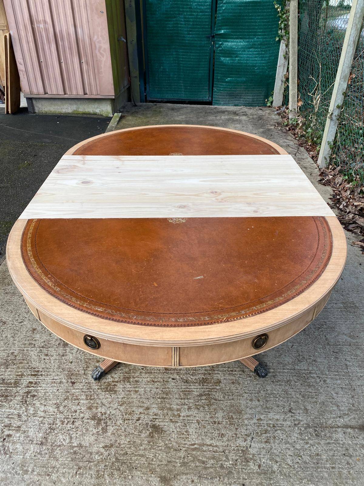 Round extendable table in Empire style, renovated with Bordeaux leather and raw wood, 168cm.