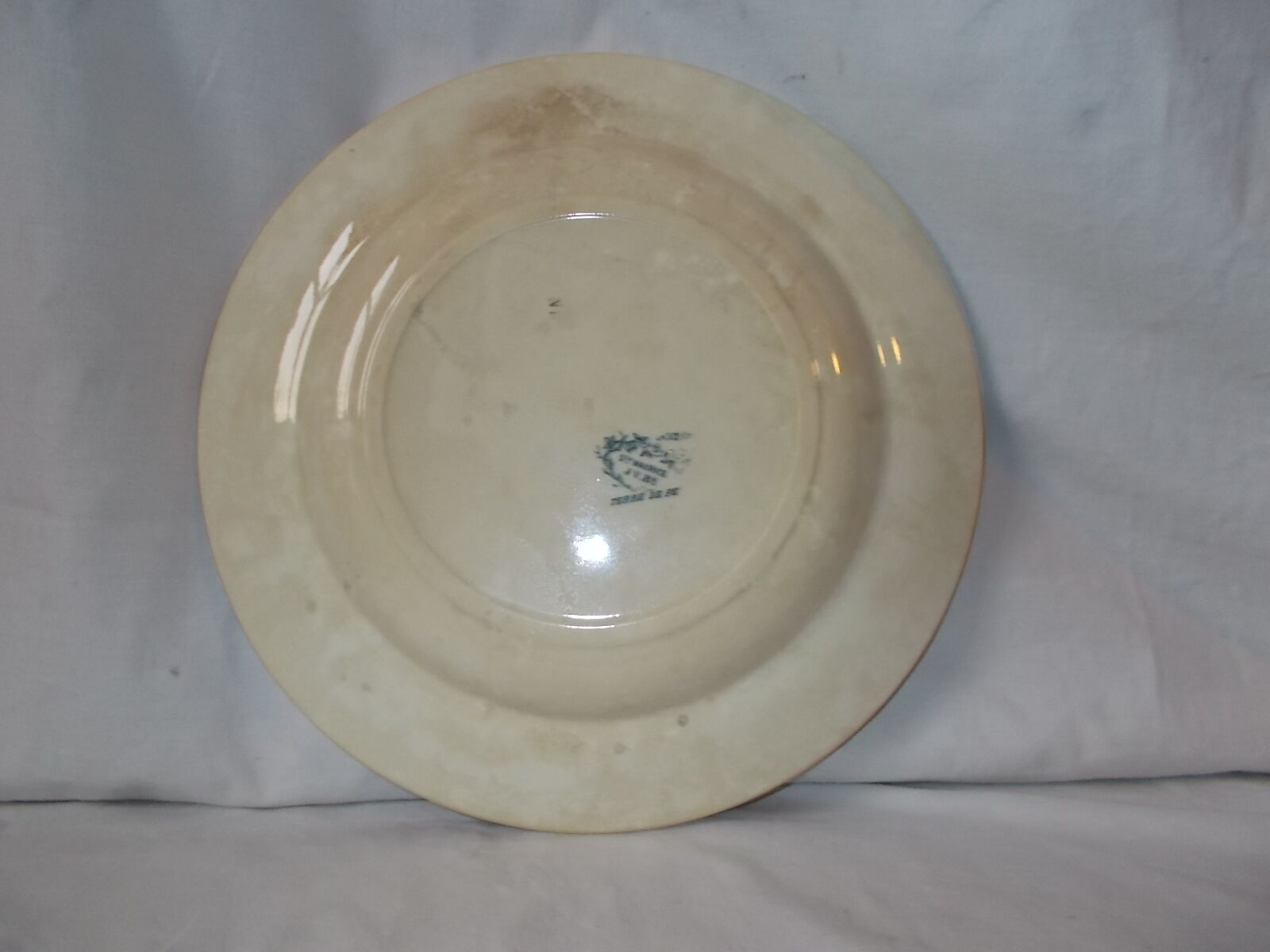 Round plate of iron earth Sce Maurice