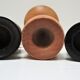 Three vintage light and dark wood candlesticks