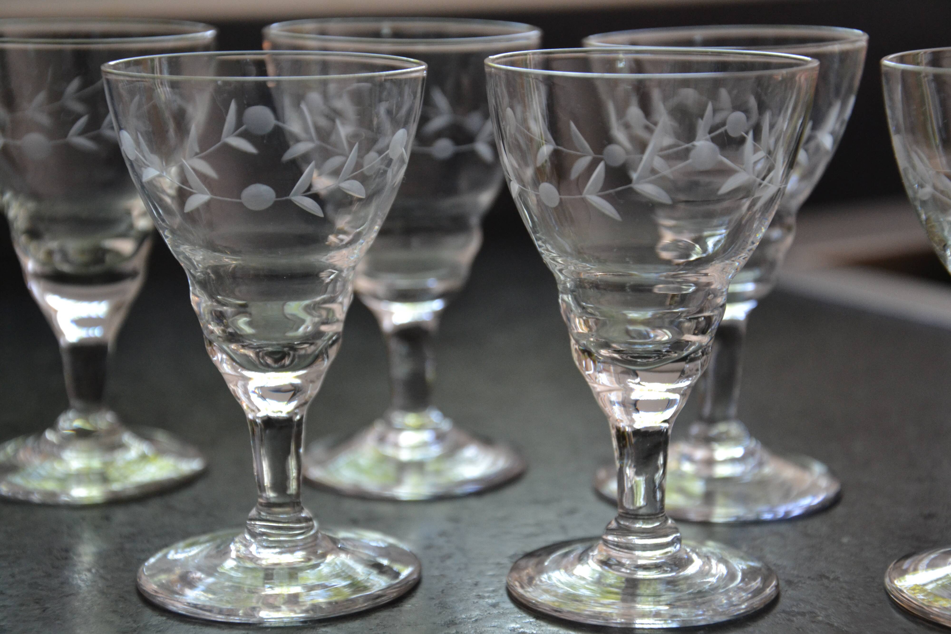 8 small old chiseled glasses