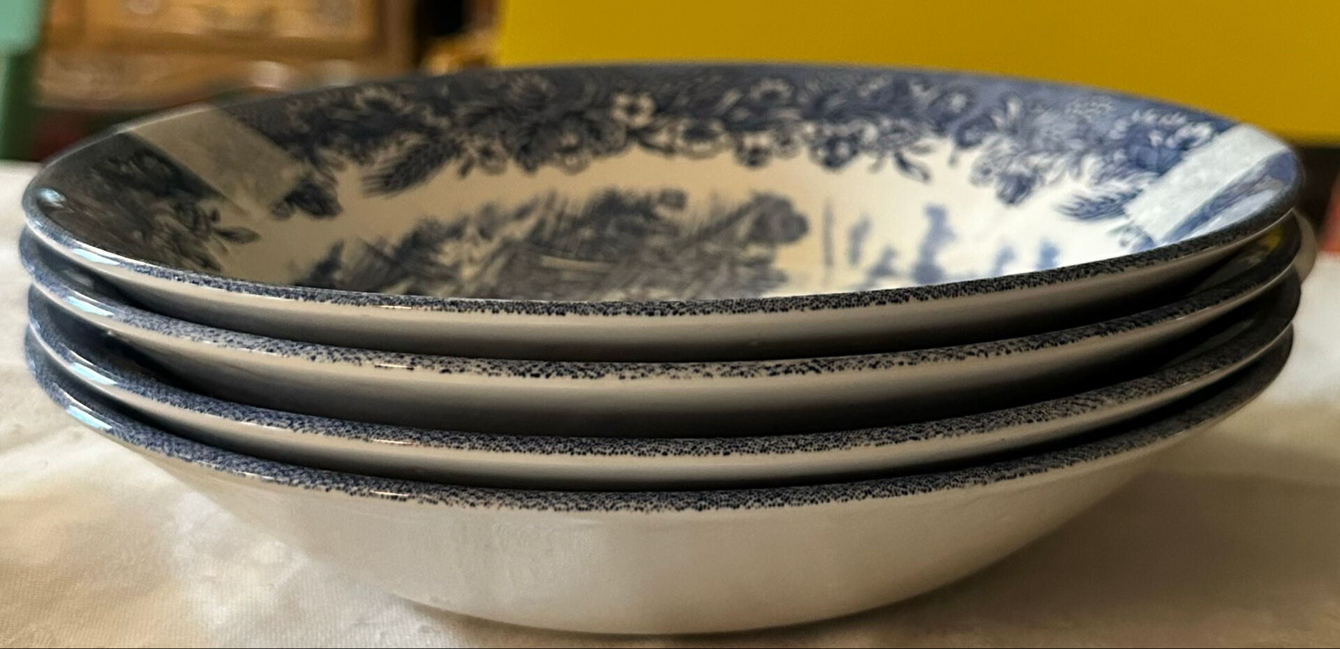 Set of 4 English deep plates by Churchill.