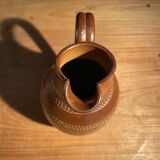Chiseled terracotta pitcher