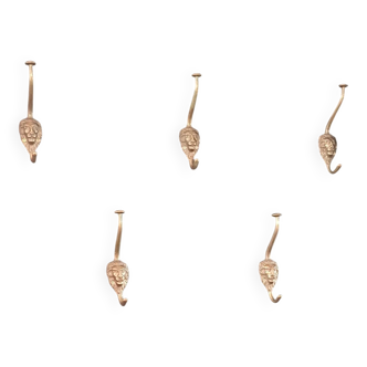Set of 5 antique "Lion Head" coat hooks.