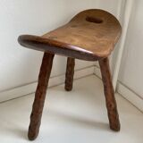 Table and its solid wooden stool of brutalist style popular art