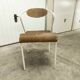 Atypical chair of the 70s metal and wood
