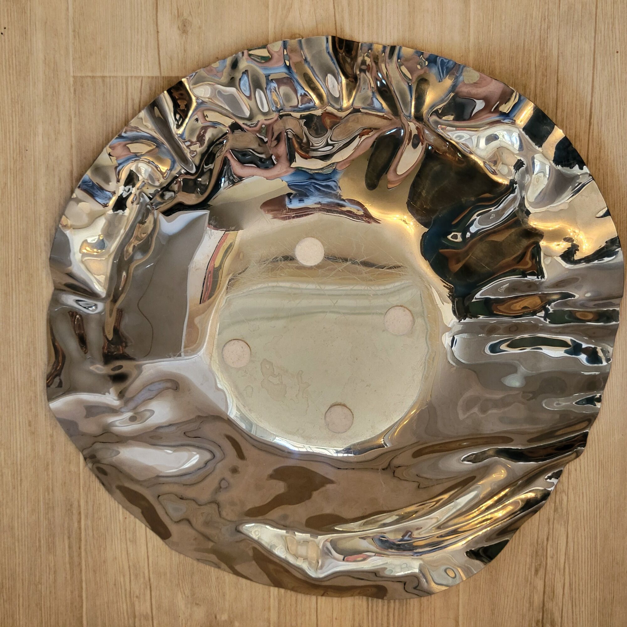 Alessi cut basket flat design Lluis Clotet in crumpled stainless steel