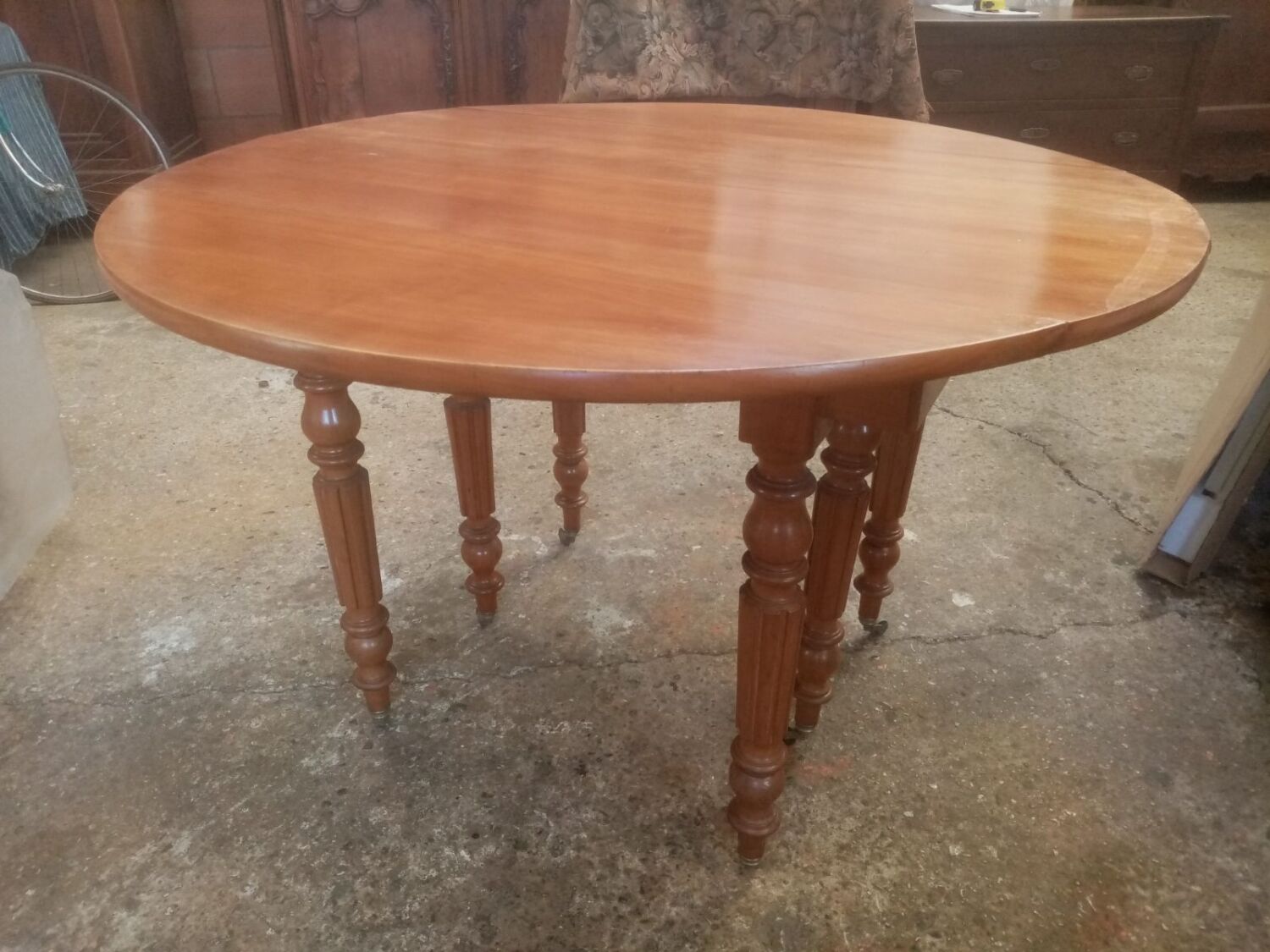 Six-legged round table in cherry wood from the late 19th century