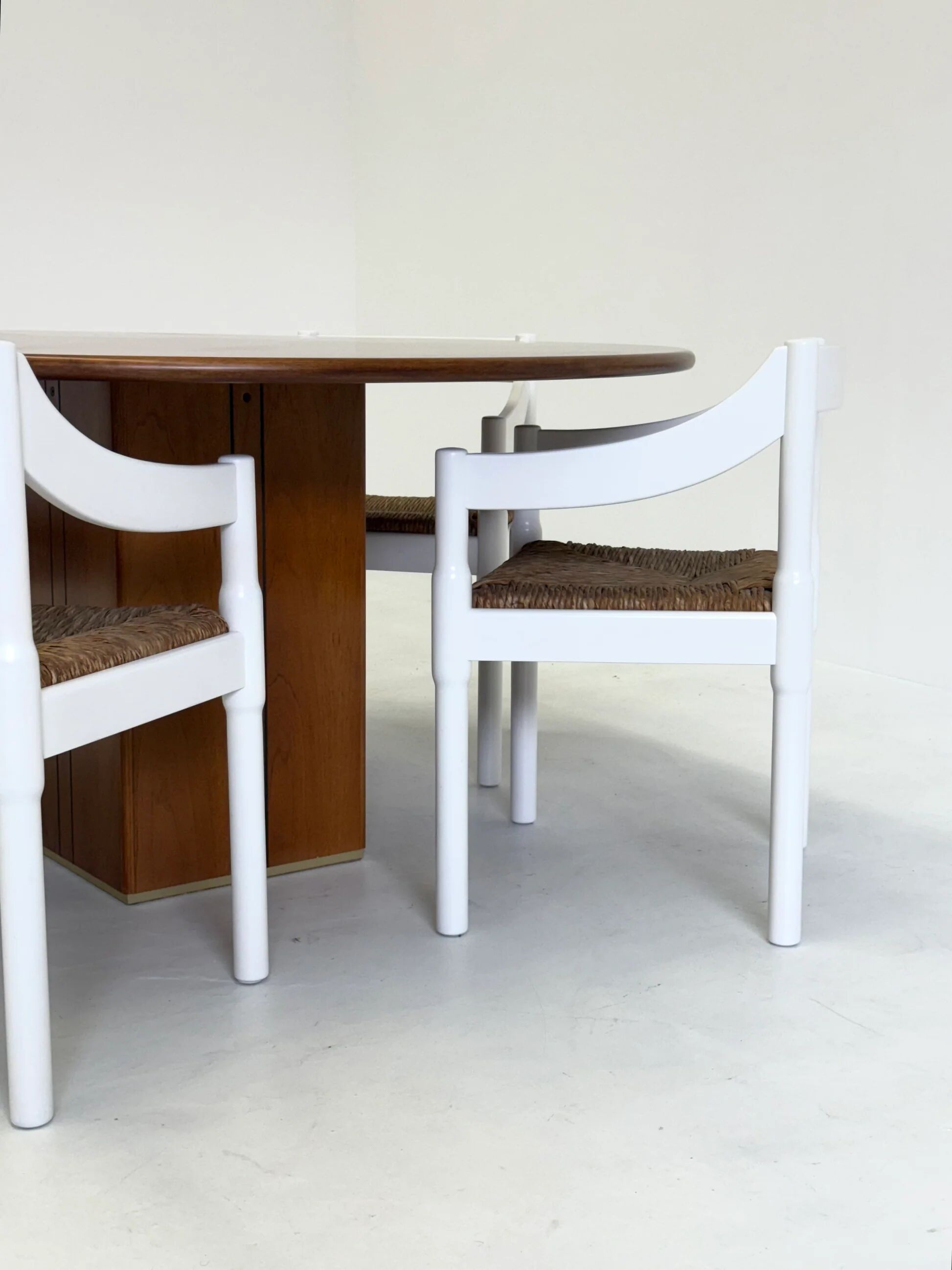Set of two Carimate chairs by Vico Magistretti in white