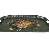 Painted metal tray decorated with flowers on a green background