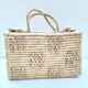 Valise vintage en fibres naturelles