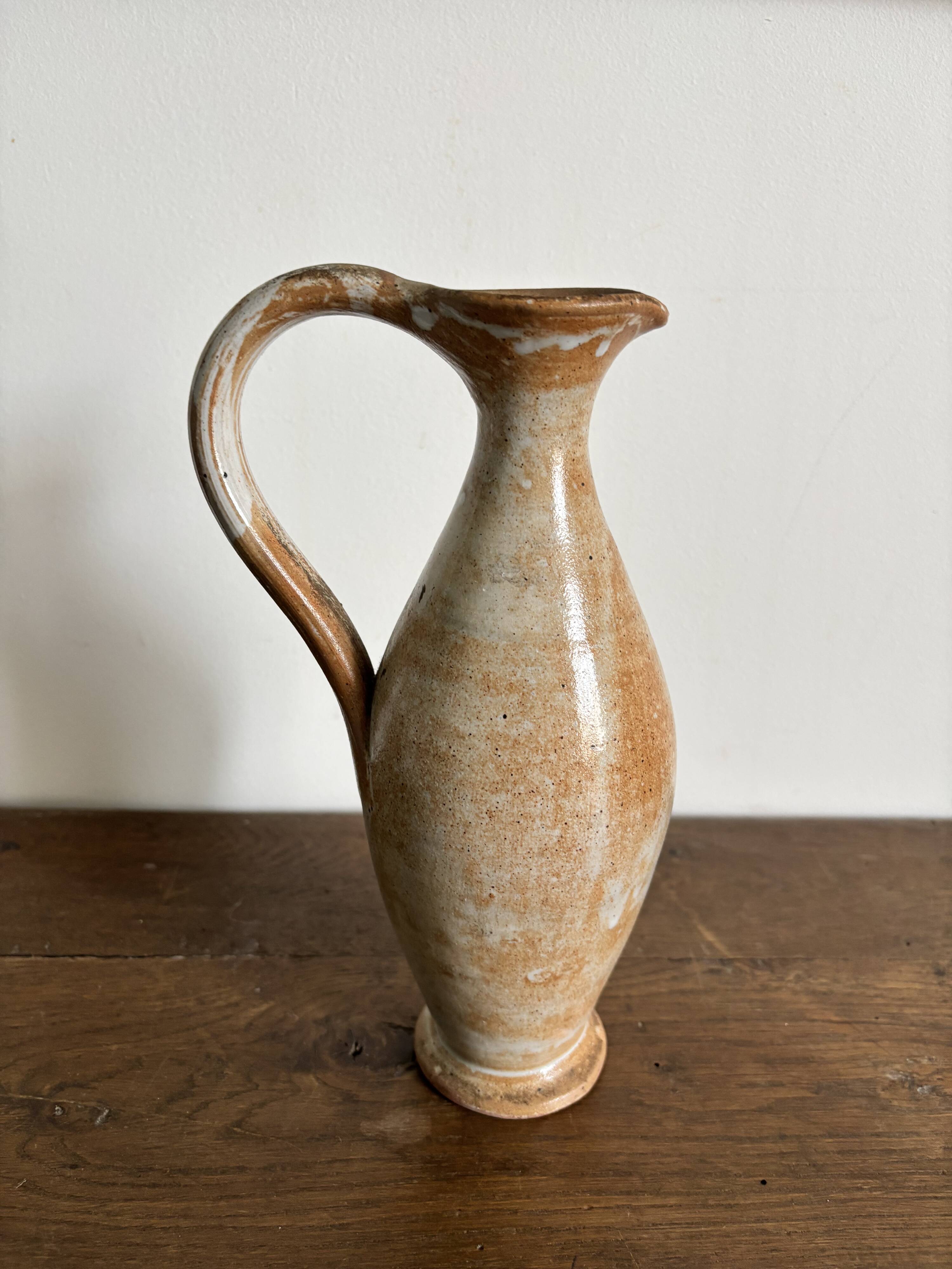 Handcrafted stoneware vase, a vintage piece from the 1960s.