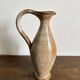 Handcrafted stoneware vase, a vintage piece from the 1960s.