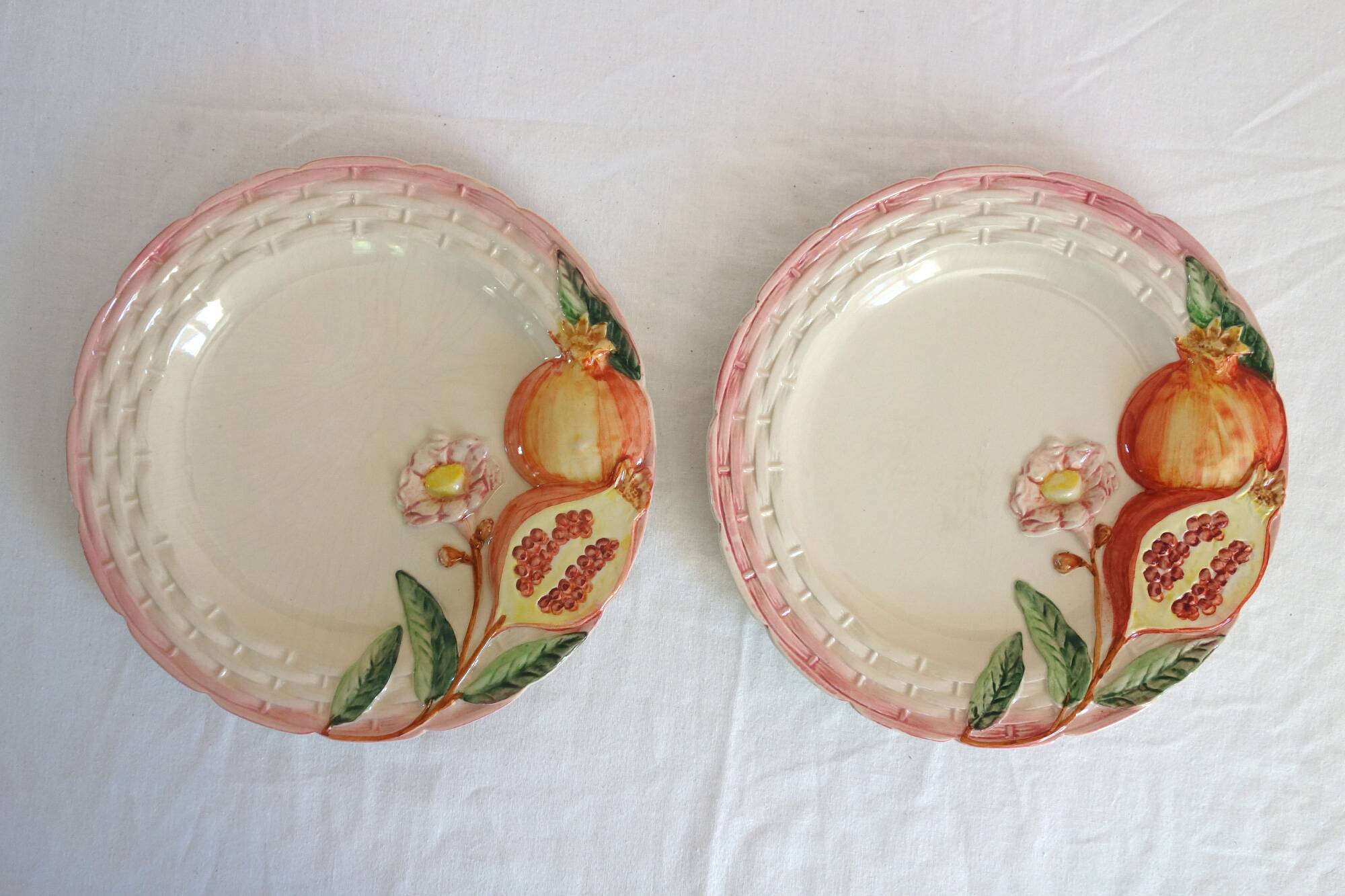2 vintage pomegranate slip plates signed Francesco Guarino
